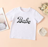Nouvelle Collection 2026 : Ensemble T-shirt à Manches Courtes Imprimé Lettres et Jupe Tendance pour Filles – Tenue 2 Pièces pour Enfants de 4 Ans
