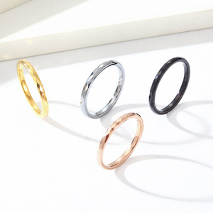 Smooth, minimalist, diamond-cut tungsten steel <b>ring</b>; unisex style; fashionable and stackable; <b>plain</b> tungsten gold jewelry. - Product Image 1