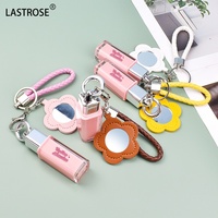 Tube de brillant à lèvres rose en gros avec miroir porte-clés brillant à lèvres liquide végétalien paillettes huile pour les lèvres maquillage longue durée marque privée