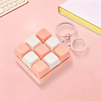 Lot de 2 jouets anti-stress en plastique 9-en-1, clavier à boutons poussoirs, porte-clés, décompression manuelle, cadeau unisexe