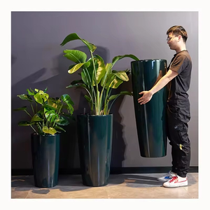 Pots de fleurs ronds en plastique PP de couleur ciment, grands, résistants et adaptés à l'intérieur et à l'extérieur - Product Image 1