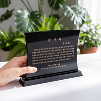 Plaque en cristal K9 incurvée noire moderne avec gravure dorée personnalisée pour la reconnaissance d'entreprise, la coopération avec des partenaires, souvenir, cadeau
