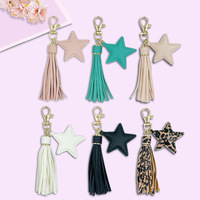 Vente en gros de porte-clés pompons en cuir PU, accessoires de sac à main, pendentif étoile pentacle coloré, porte-clés cadeau promotionnel