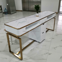 Table de manucure avec cadre doré tendance avec aspirateur