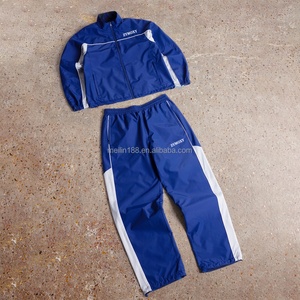 Ensemble de survêtement streetwear personnalisé en nylon pour homme : veste coupe-vent et pantalon en nylon de haute qualité – Design de survêtement anti-vent - Product Image 1