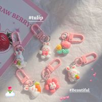 Porte-clés pendentif lapin radis en résine avec fleurs, style dessin animé mignon, accessoire de charme pour sac