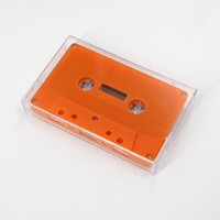 Vente en gros d'étuis à cassettes rétro transparents de haute qualité étui vide en plastique étui vierge pour cassettes audio avec moyeux/broches