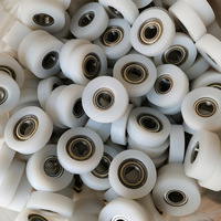 Poulies en plastique directement de l'usine : Roues de guidage en POM à faible friction et rouleaux en nylon résistants à l'usure pour portes de garage.
