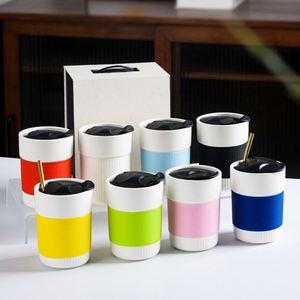 Custom logo Festival Business Gift Box Set 450ml Silicone Sleeve <b>Ceramic</b> Double Wall Insulated Travel Coffee Cup with Slider <b>Lid</b> - Product Image 1