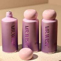 Tubo cosmético metálico degradado en morado y rosa con tapa de rosca redonda para suero de ojos y cuidado de la piel.