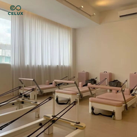 Machine de Pilates Reformer Commerciale en Alliage d'Aluminium Rose pour Femmes avec Rails de Glisse Silencieux pour Studios de Yoga