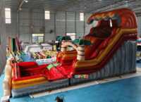 Toboggan aquatique commercial KUOYE d'été en forme de dinosaure, toboggan aquatique gonflable avec piscine amovible pour la location événementielle