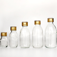 Bouteilles en verre transparent personnalisées de 30 ml, 60 ml, 100 ml, 120 ml, 150 ml pour les shots de jus de gingembre, les boissons énergisantes, les compléments alimentaires avec bouchon à vis