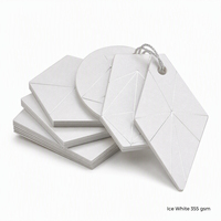 Étiquettes de vêtements en carton personnalisées de 355 g/m² pour la vente au détail de vêtements avec impression de logo, fourniture d'usine, service de conception gratuit
