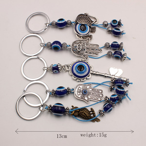 Venta al por mayor turco mal de ojo llavero accesorio Kingcome mano búho llavero Ojo <span class=keywords><strong>del</strong></span> <span class=keywords><strong>diablo</strong></span> Palma Fátima llavero - Product Image 2