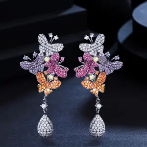 优雅的设计师微型铺面立方氧化锆宝石紫红色长款蝴蝶滴耳环，用于女性订婚珠宝