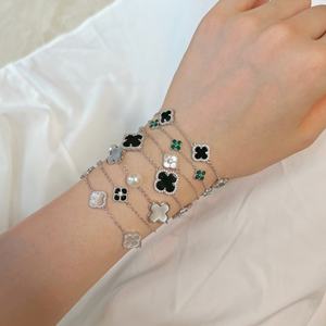 <span class=keywords><strong>Bracelet</strong></span> de charme trèfle à quatre feuilles en <span class=keywords><strong>agate</strong></span> véritable double face plaqué or 18 carats en acier inoxydable de haute qualité 1,5 mm - Product Image 1