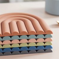 Vente en gros Tapis isolant antidérapant pour cuisine style moderne Porte-pot en silicone résistant à la chaleur Vaisselle de table Napperon Sous-verre