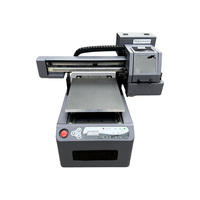 Impresora de inyección de tinta plana UV de tamaño A2 de alta calidad 4050 con cabezal de impresión XP600 Impresión rápida para material flexible Buen precio