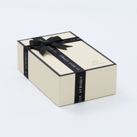 Boîte cadeau rigide de luxe OEM pour crème pour le visage, emballage cosmétique, gaufrage, doublure en éponge, ruban, nœud, recyclable, certifié ISO9001