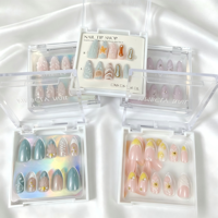 Vente en gros de faux ongles personnalisés à étiquette privée, en amande, avec des motifs variés, finition brillante, ensemble de faux ongles