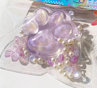 Jouet à presser souple en forme de petit gâteau ou beignet, parfumé violet, en TPR, fait main, souple et moelleux, en forme de patte de chat Taba