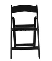 Chaises pliantes en résine noires Wimbledon pour événements, mariages et banquets en plein air – Vente en gros