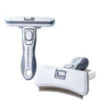 Brosse autonettoyante pour animaux de compagnie avec lame double couche pour l'élimination des poils et la démêlage des chiens et des chats