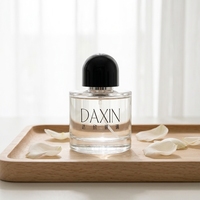 Flacon de parfum en verre transparent minimaliste, vente en gros, logo personnalisé, vide, 50 ml, 100 ml, flacon pulvérisateur de parfum avec capuchon noir en forme de dôme