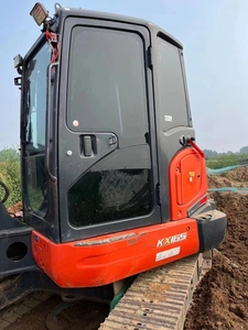 Mini-excavatrice sur chenilles KX165 d'occasion, état d'origine, 6 tonnes, pompe japonaise, certifiée CE, avec accessoires tarière et brise-roche - Product Image 4