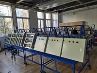 Armoire de commande PLC basse tension à prix d'usine avec boîtier de distribution HMI et protection contre les surcharges et les surtensions en acier inoxydable