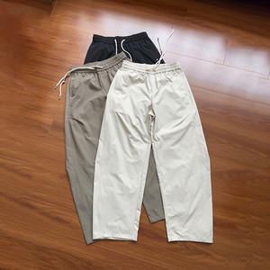 <span class=keywords><strong>Pantaloni</strong></span> Sportivi Unisex Larghi <span class=keywords><strong>con</strong></span> <span class=keywords><strong>Elastico</strong></span> <span class=keywords><strong>in</strong></span> Vita e Coulisse, <span class=keywords><strong>in</strong></span> Poliestere, per Palestra e Sport, Gamba Larga, Personalizzabili, Casual, Stile Baggy - Product Image 1