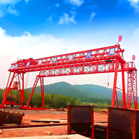 Grue portique à double poutre et double crochet, montée sur rail, capacité 100 tonnes