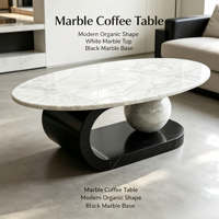 Table basse de luxe en marbre noir et blanc. Décoration de salon durable, minimaliste, moderne, sculpturale, en forme de sphère avec base incurvée.