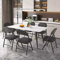 Chaise pliante noire de style boutique avec structure métallique pour fêtes et restaurants