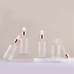 Best Selling Rose Gold Cap 1oz 2oz 4oz Clear Glass Essential Oil Dropper Bottles For Oil In Stock