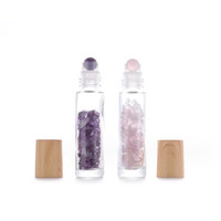 Flacon roll-on en verre transparent de 10 ml avec bille en pierres précieuses et copeaux, et bouchon en plastique imitation bois pour huiles essentielles et parfums