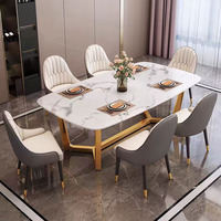 Ensemble de table à manger moderne Hanyee avec 6 chaises, plateau en ardoise grise italienne, structure en acier carbone doré, mobilier haut de gamme pour salle à manger