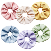 Vente en gros d'accessoires de mode pour cheveux de haute qualité : élastiques en cuir PU froissé, pinces à cheveux, attaches pour cheveux et chouchous pour femmes