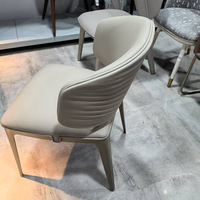 Chaise de salle à manger moderne de luxe léger, dossier en acier inoxydable à motif ondulé, écologique, confortable et durable pour la maison, l'appartement et le centre commercial
