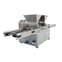 Machine industrielle automatique pour la fabrication de biscuits et de gâteaux, avec extrudeuse, coupe-fil et moule à biscuits