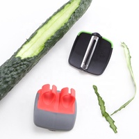 Éplucheur manuel créatif pour légumes, fruits, pommes de terre et pommes, en acier inoxydable, plastique et silicone, avec lame tranchante et poignée ergonomique double pour les doigts
