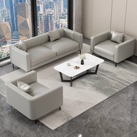 Ensemble de canapé et table basse de luxe en cuir PU pour hôtel, réception d'entreprise, deux places, design moderne et simple, métal