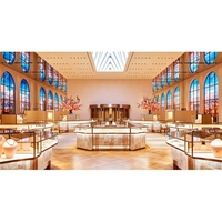 Vitrine haut de gamme en marbre et or rose pour bijouterie, conception complète de magasin sur mesure ODM/OEM, solution de présentation tout-en-un