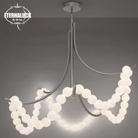 Lampe suspendue de style français personnalisée pour salon, éclairage de plafond circulaire pour escaliers, luminaire suspendu en forme d'anneau en albâtre perlé