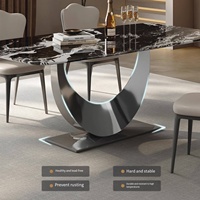 Table à manger moderne en pierre noire Moon, fabriquée en Chine, pour restaurant