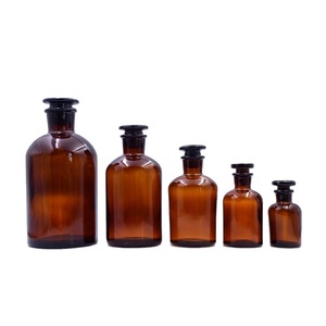 Hot selling 60 ml to 1000 ml round amber glass apothecary jar glass packing bottle with glass lid