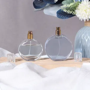 Luxus 50 ml transparente leere Parfümflasche flache runde Parfüm-Glasflasche mit Spray