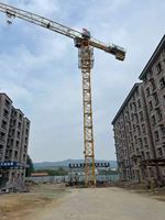 Grue à tour de construction Zoomlion 7527 d'occasion en bon état, 16 tonnes, flèche de 60 m, moment de charge élevé 1250KN.M pour bâtiments de grande hauteur