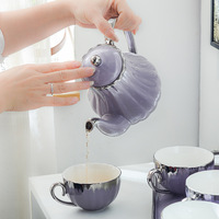 Service à thé et café de luxe en céramique, porcelaine et porcelaine à la cendre d'os, comprenant théière, tasses et soucoupes